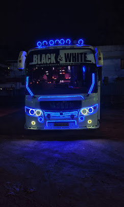 Bus decorated with blue lights at night